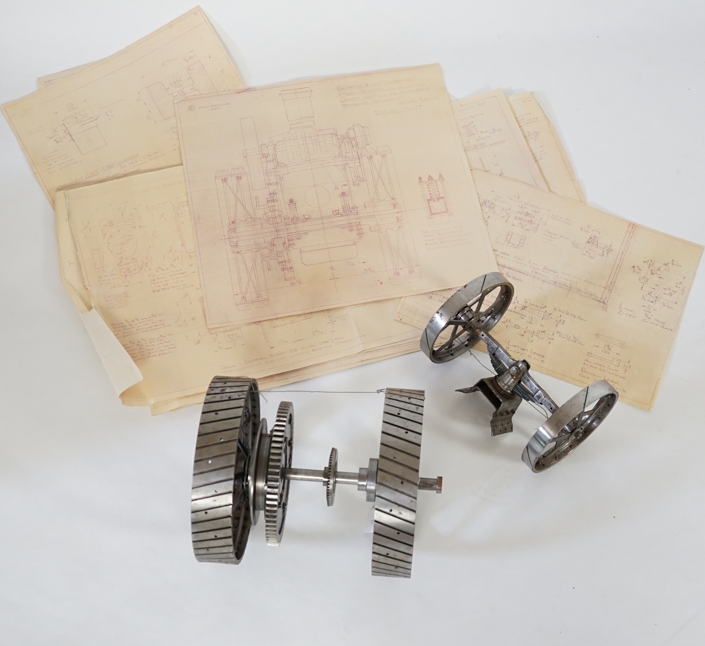 A partially constructed kit comprising of the major components of machined and cast parts to build a two inch scale live steam Ransomes 4 N.H.P. traction engine, including a set of drawings
